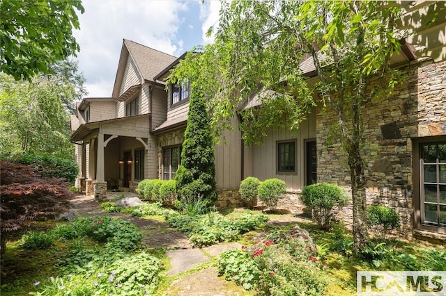115 Falls Ct W, Highlands, NC 28741 - view of front facade featuring stone siding and board and batten siding