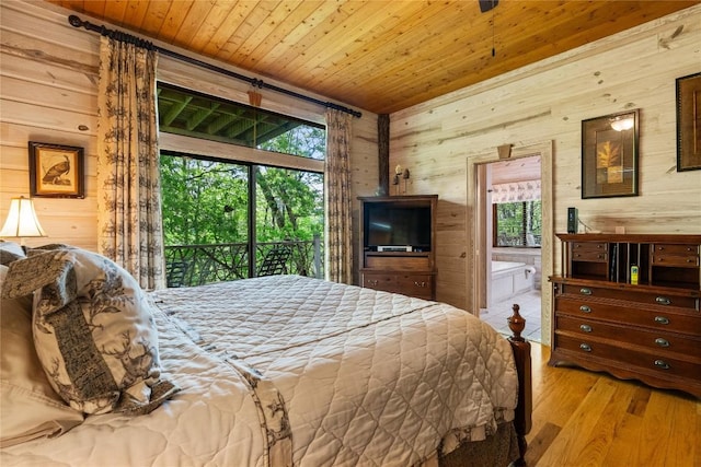 bedroom with light hardwood / wood-style flooring, access to exterior, wooden walls, and wooden ceiling