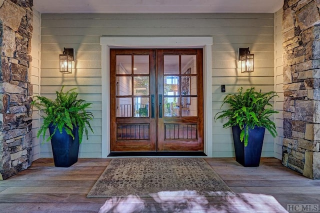 entrance to property featuring french doors