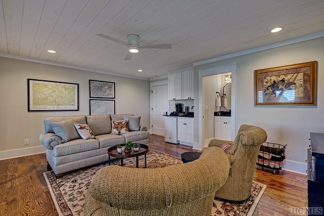 living room with hardwood / wood-style flooring, wooden ceiling, ornamental molding, and ceiling fan