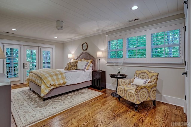 bedroom with ceiling fan, light wood-type flooring, access to exterior, and wooden ceiling