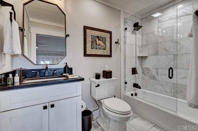 full bathroom featuring toilet, combined bath / shower with glass door, and vanity