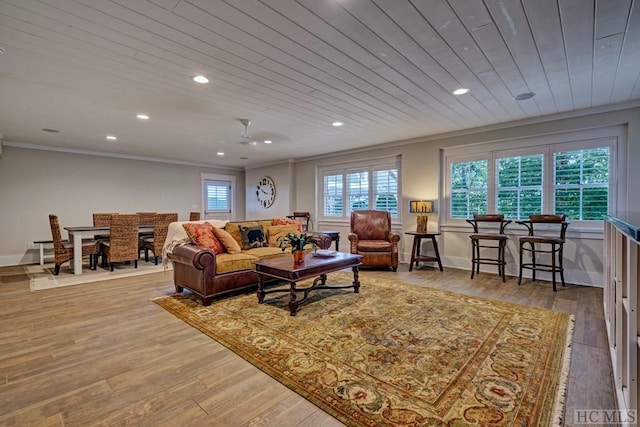 living room with ornamental molding, wood ceiling, and hardwood / wood-style floors