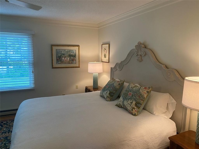 711 Horse Cove Rd Unit C-4, Highlands, NC 28741 - bedroom with ornamental molding and baseboard heating