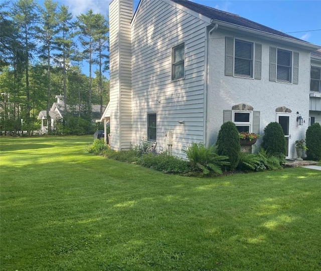 711 Horse Cove Rd Unit C-4, Highlands, NC 28741 - view of side of home with a lawn and a chimney
