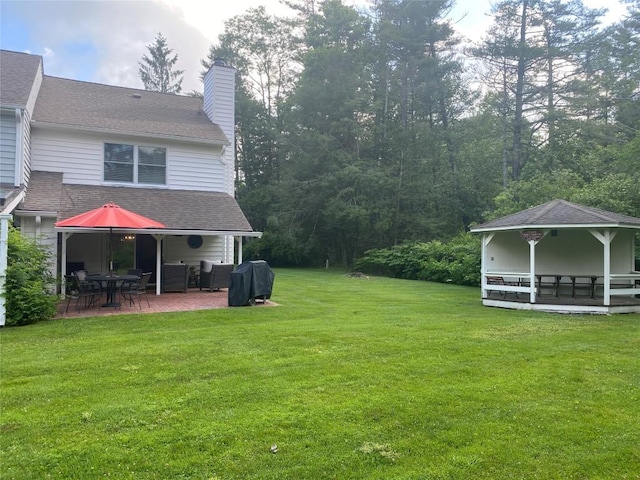 711 Horse Cove Rd Unit C-4, Highlands, NC 28741 - view of grassy yard with a patio