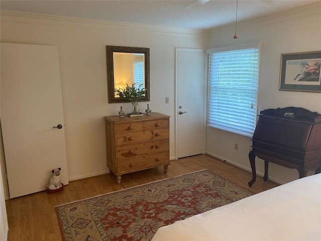 711 Horse Cove Rd Unit C-4, Highlands, NC 28741 - bedroom with wood finished floors and crown molding