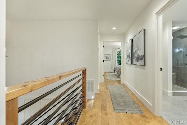 hall featuring light hardwood / wood-style flooring