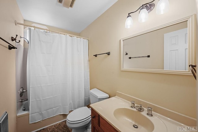 full bathroom with shower / bathtub combination with curtain, vanity, and toilet