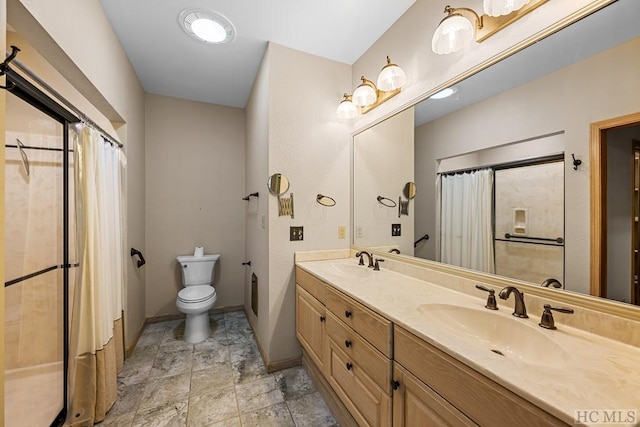 bathroom featuring vanity, a shower with curtain, and toilet