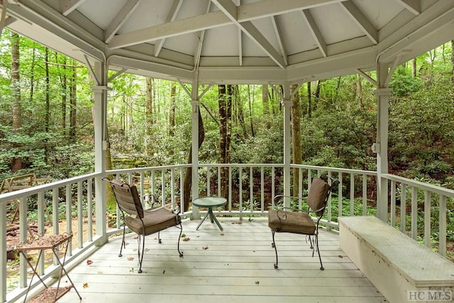 wooden terrace with a gazebo