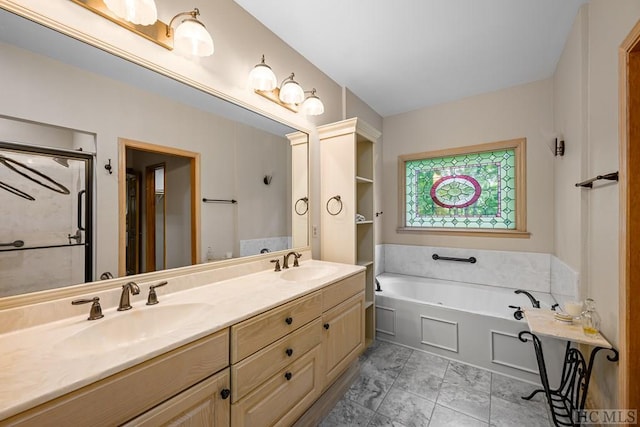 bathroom featuring vanity and shower with separate bathtub