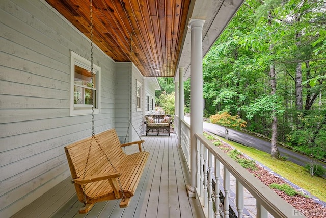 wooden deck with a porch