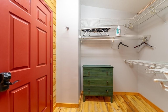 spacious closet with light wood-style flooring