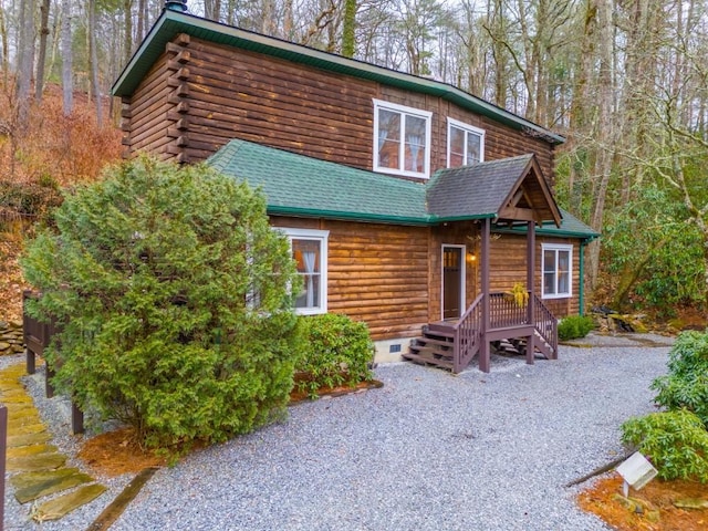 log cabin featuring crawl space