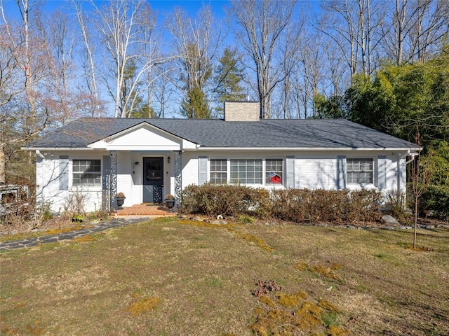 ranch-style house with a front yard