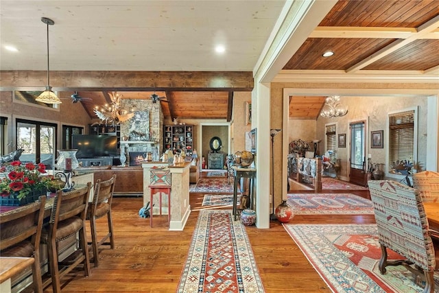 159 Highlands Pt, Highlands, NC 28741 - dining room with a chandelier, wooden ceiling with exposed beams, wood finished floors, ceiling fan, and a large fireplace