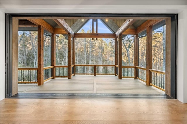 unfurnished sunroom with plenty of natural light