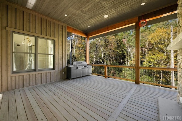 wooden deck with area for grilling