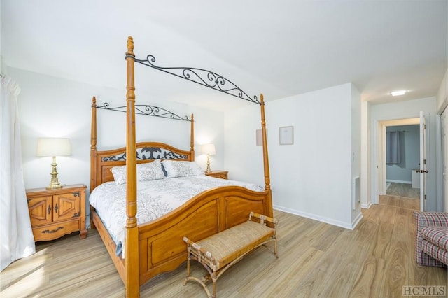 bedroom with light hardwood / wood-style flooring