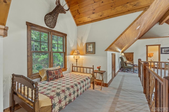 carpeted bedroom featuring lofted ceiling with beams and wooden ceiling