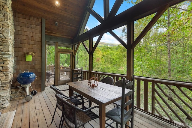 wooden deck featuring area for grilling