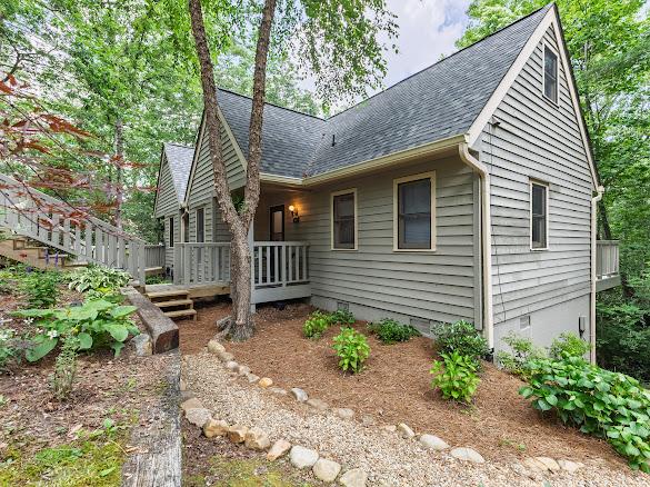 49 Kiwi Ln Unit 14, Sapphire, NC 28774 - view of front of property featuring roof with shingles and a wooden deck