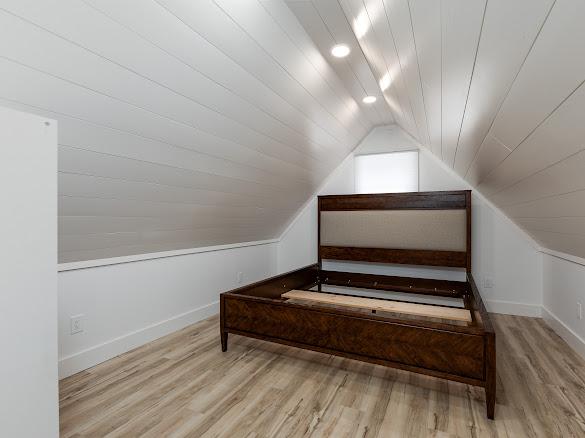 49 Kiwi Ln Unit 14, Sapphire, NC 28774 - stairs featuring vaulted ceiling and wood finished floors