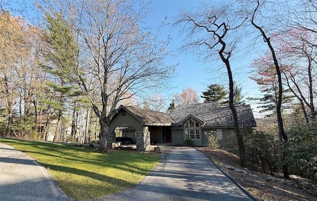 258 Club Colony Ln, Lake Toxaway, NC 28747 - tudor-style house featuring driveway, a front yard, and a chimney