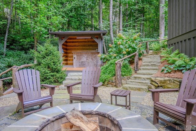 view of patio featuring a fire pit