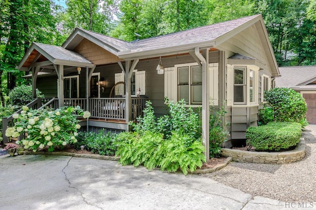 view of front of property featuring covered porch