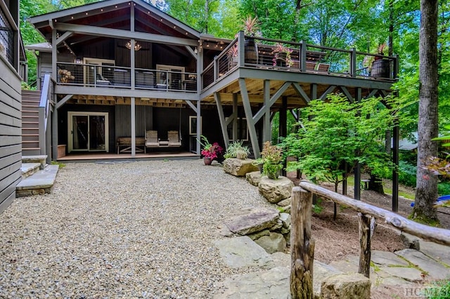 rear view of house with a deck