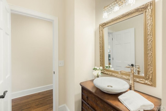 bathroom featuring vanity and wood-type flooring