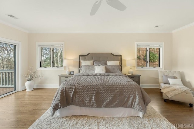 bedroom with ceiling fan, ornamental molding, light hardwood / wood-style floors, and access to outside