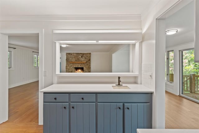 66 Hemlock Ln, Highlands, NC 28741 - bathroom featuring wood finished floors, vanity, baseboards, and ornamental molding