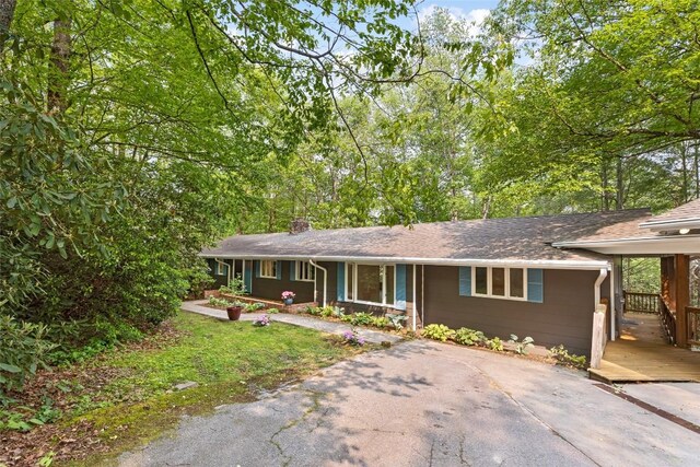 66 Hemlock Ln, Highlands, NC 28741 - single story home with a chimney and asphalt driveway
