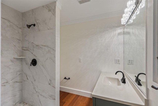 66 Hemlock Ln, Highlands, NC 28741 - full bath featuring vanity, a marble finish shower, and wood finished floors