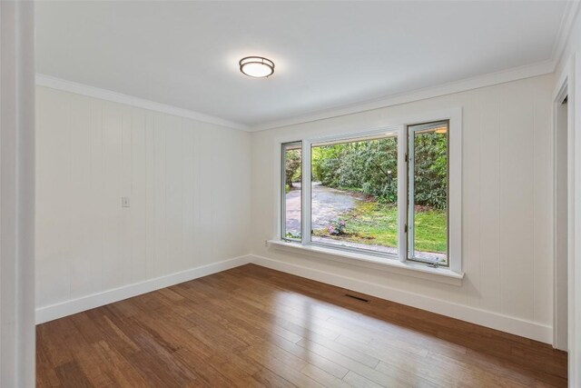 66 Hemlock Ln, Highlands, NC 28741 - spare room featuring wood finished floors, baseboards, and crown molding