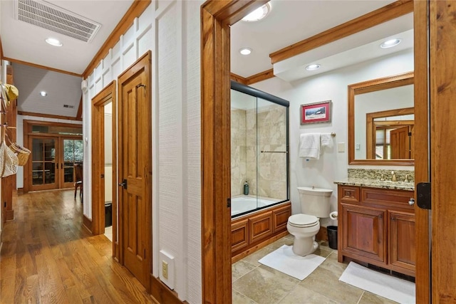 392 Birchwood Dr Unit 392, Highlands, NC 28741 - full bath featuring ornamental molding, toilet, shower / bath combination with glass door, vanity, and recessed lighting