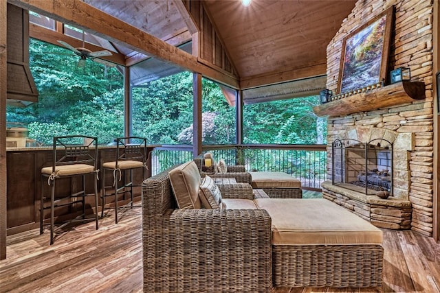 392 Birchwood Dr Unit 392, Highlands, NC 28741 - sunroom / solarium with vaulted ceiling, ceiling fan, and an outdoor living space with a fireplace