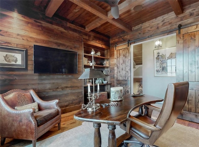 39 Firesong Ln, Glenville, NC 28736 - office space with a barn door, a wood ceiling with exposed beams, wooden walls, and wood finished floors