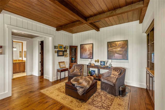 39 Firesong Ln, Glenville, NC 28736 - sitting room featuring a wood ceiling with exposed beams, hardwood / wood-style floors, and wooden walls