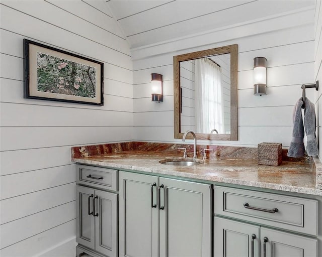 39 Firesong Ln, Glenville, NC 28736 - bathroom with vanity, wooden walls, and lofted ceiling