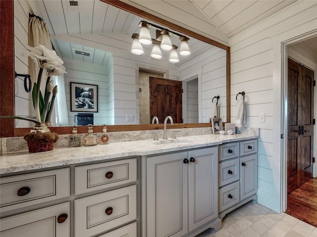 39 Firesong Ln, Glenville, NC 28736 - full bath with wood walls, lofted ceiling, vanity, and wood ceiling