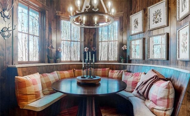 39 Firesong Ln, Glenville, NC 28736 - dining area featuring breakfast area, a chandelier, and wood walls