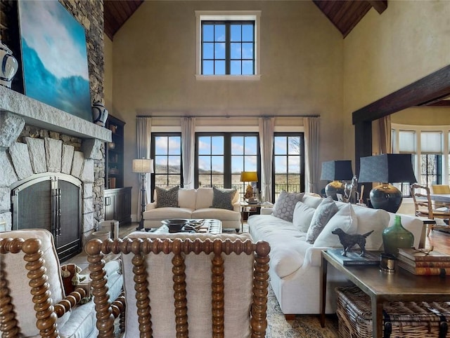 39 Firesong Ln, Glenville, NC 28736 - living area with high vaulted ceiling, a stone fireplace, and wood ceiling