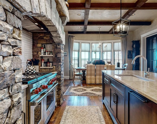 39 Firesong Ln, Glenville, NC 28736 - kitchen with stainless steel appliances, dark wood-style floors, light stone counters, coffered ceiling, and a chandelier