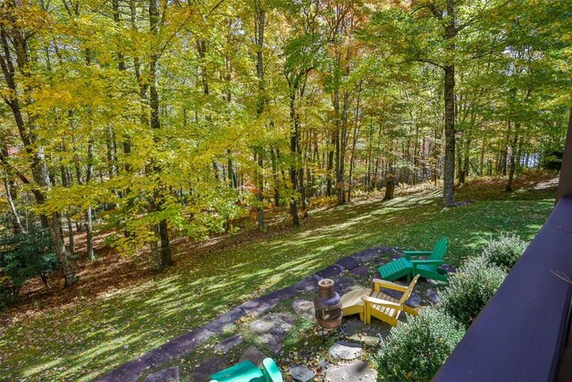view of yard featuring a view of trees