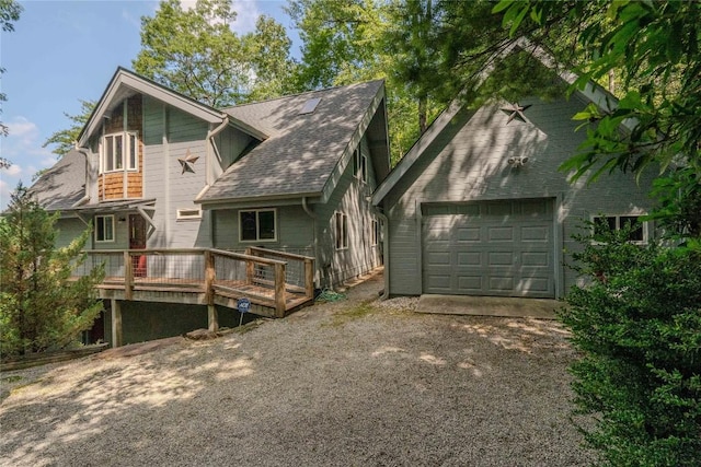 735 Trays Island Rd, Sapphire, NC 28774 - back of property featuring a deck and driveway