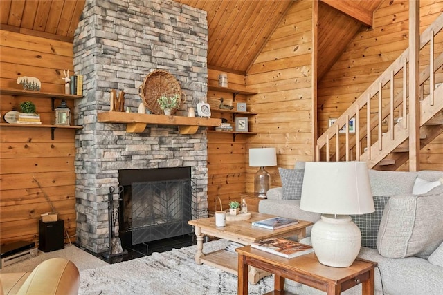 735 Trays Island Rd, Sapphire, NC 28774 - living room with wooden ceiling, vaulted ceiling, a fireplace, wooden walls, and stairway